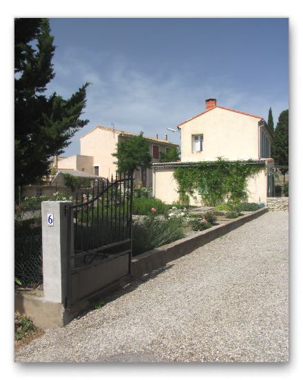 The approach to the driveway through the main gate.