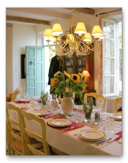 The harvest table set for dinner.